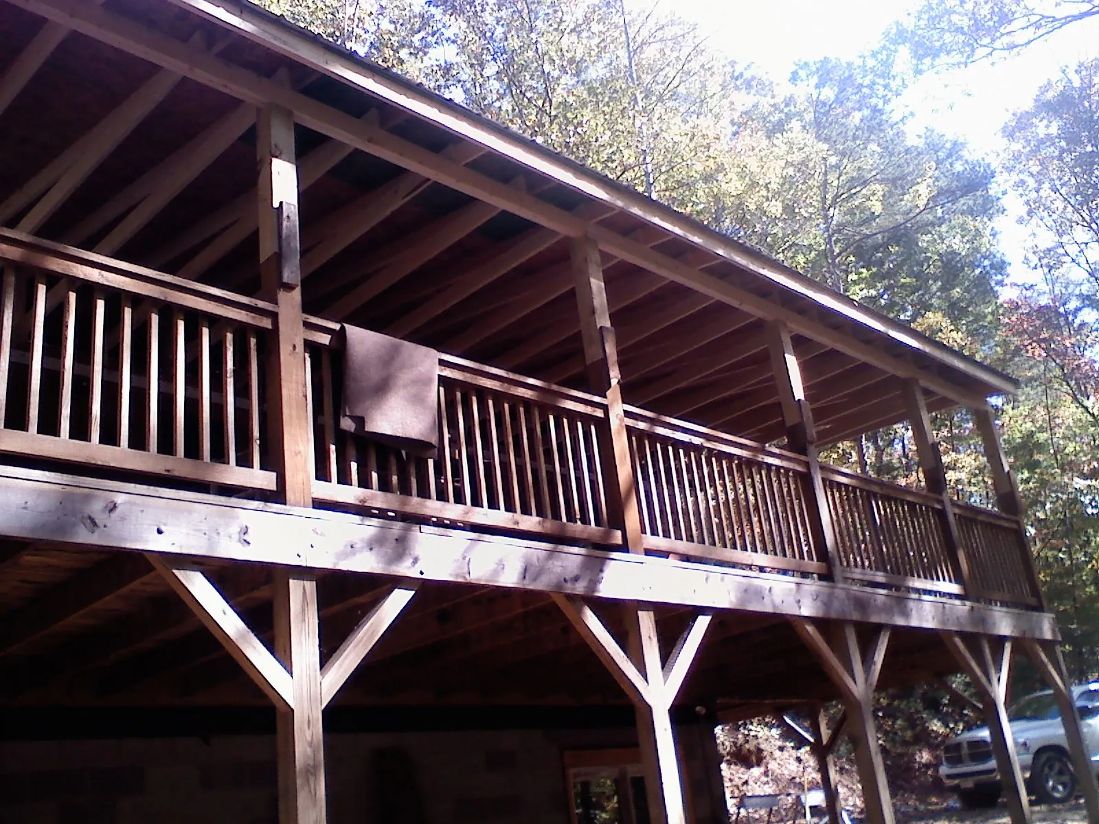 Timber framing under a new elevated porch and deck — Roof Leak Repair in Greenland by Roofing Brothers